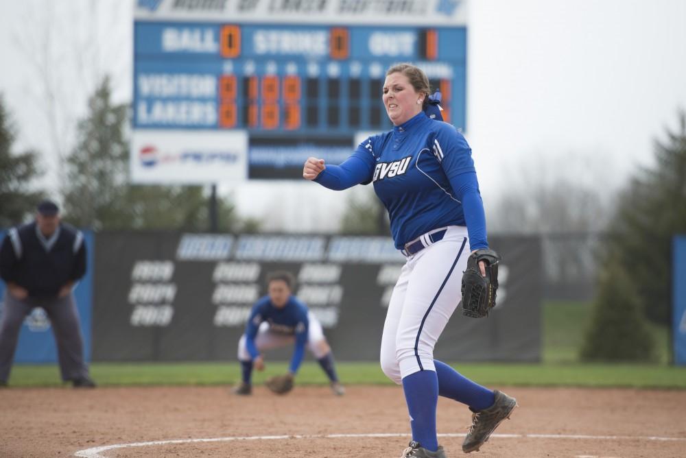 GVL / Luke Holmes - Allison Lipovsky (18) throws the pitch. Grand Valley Womens Softball won 9-5 in their first game against Lake Superior State.