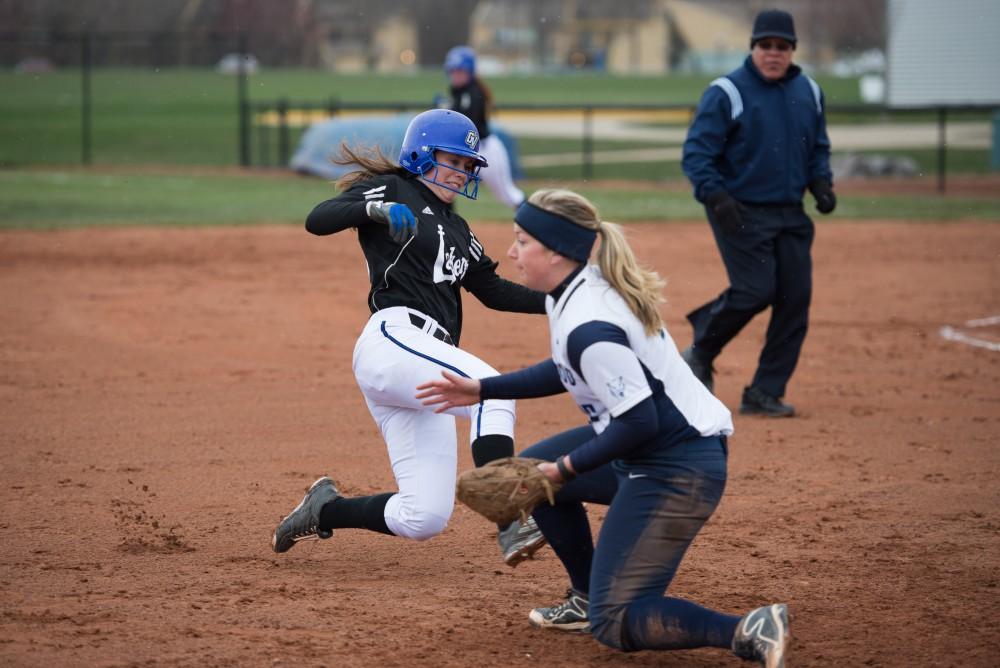 GVL / Luke Holmes - Kaylie Rhynard (6) slides into third base. Grand Valley State University defeated Northwood University in both games at the Grand Valley softball field Thursday, Apr. 7, 2016.