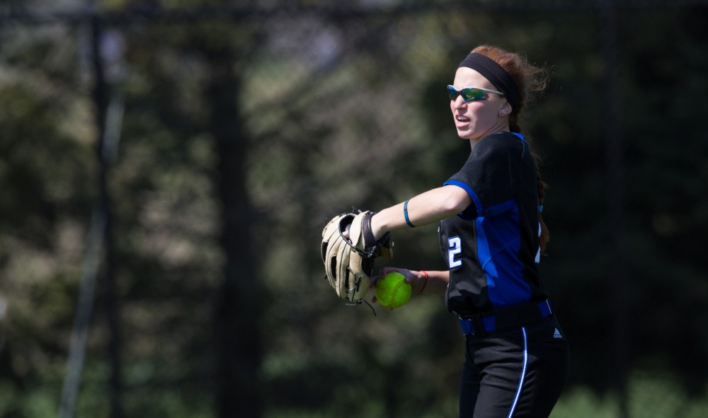 GVL / Kevin Sielaff – Kelsey Dominguez (2) warms up before the start of an inning. Grand Valley takes the victory over Walsh in both games held in Allendale on Saturday, April 23, 2016.