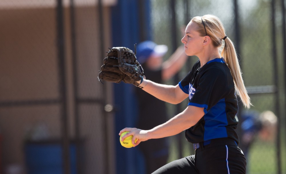 GVL / Kevin Sielaff – Ellie Balbach (11) winds up and prepares to pitch. Grand Valley takes the victory over Walsh in both games held in Allendale on Saturday, April 23, 2016.