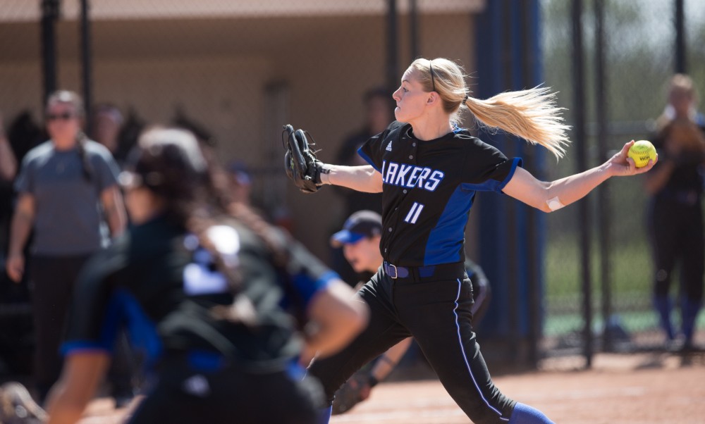 GVL / Kevin Sielaff – Ellie Balbach (11) winds up and prepares to pitch. Grand Valley takes the victory over Walsh in both games held in Allendale on Saturday, April 23, 2016.