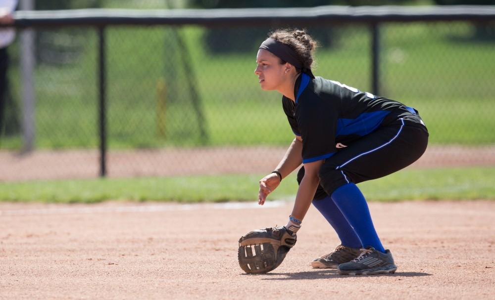 GVL / Kevin Sielaff – Teagan Shomin (9) waits for a ball to be hit her way. Grand Valley takes the victory over Walsh in both games held in Allendale on Saturday, April 23, 2016.