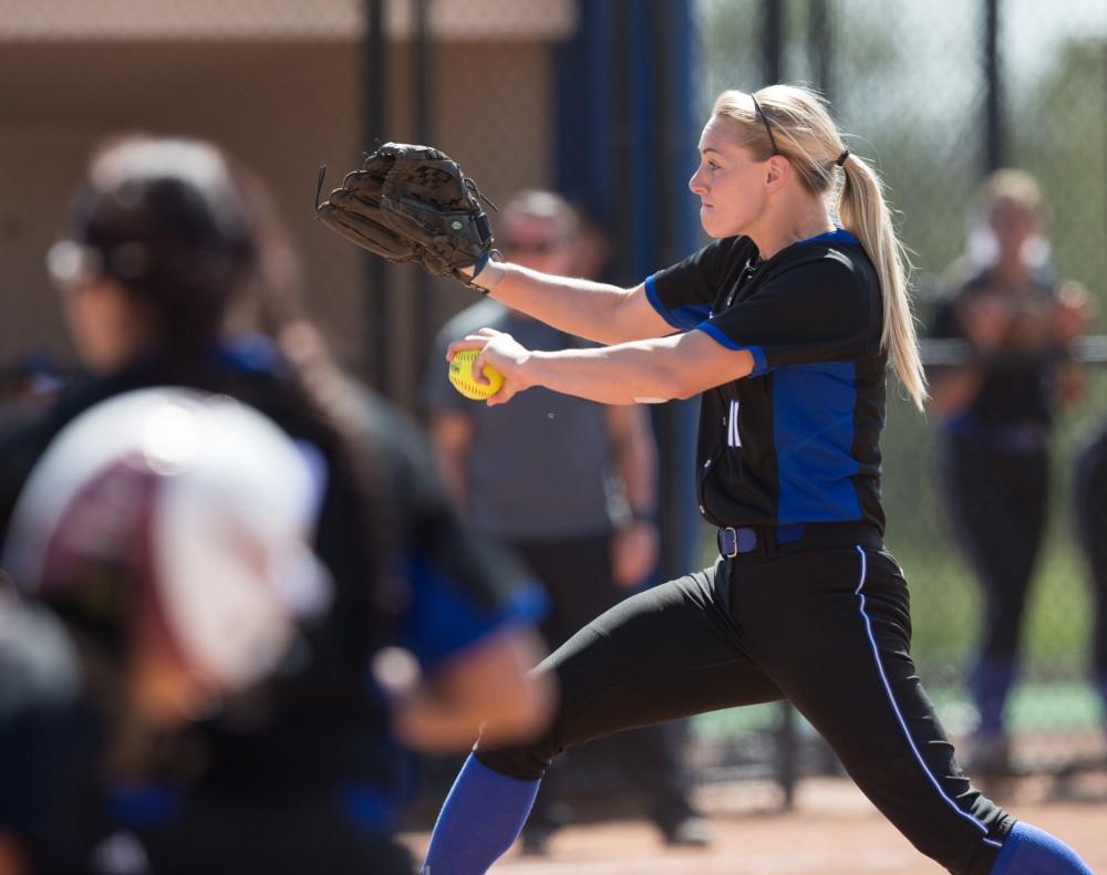 GVL / Kevin Sielaff – Ellie Balbach (11) winds up and prepares to pitch. Grand Valley takes the victory over Walsh in both games held in Allendale on Saturday, April 23, 2016.