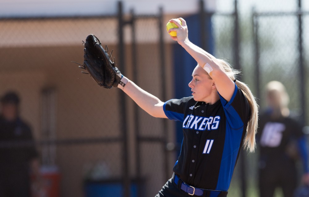 GVL / Kevin Sielaff – Ellie Balbach (11) winds up and prepares to pitch. Grand Valley takes the victory over Walsh in both games held in Allendale on Saturday, April 23, 2016.