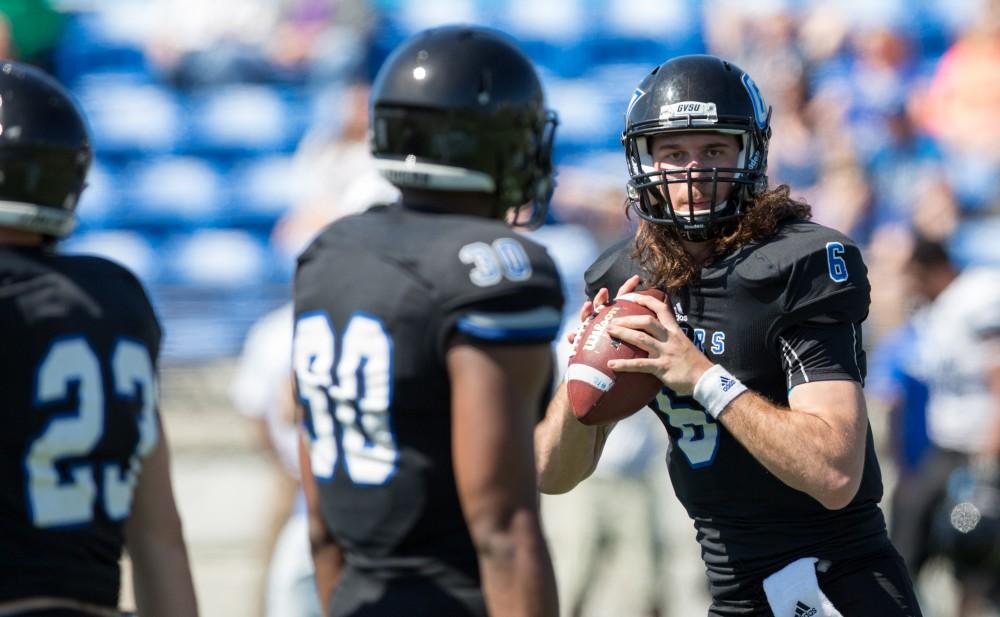 GVL / Kevin Sielaff - Bart Williams (6) lines up a pass during warm-ups and throws the ball downfield. The 2016 Grand Valley State Spring Classic is hosted at Lubbers Stadium on Saturday, April 16, 2016.