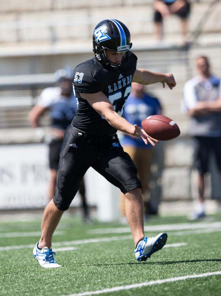 GVL / Kevin Sielaff - Collin Cribley (53) punts the football downfield. The 2016 Grand Valley State Spring Classic is hosted at Lubbers Stadium on Saturday, April 16, 2016.