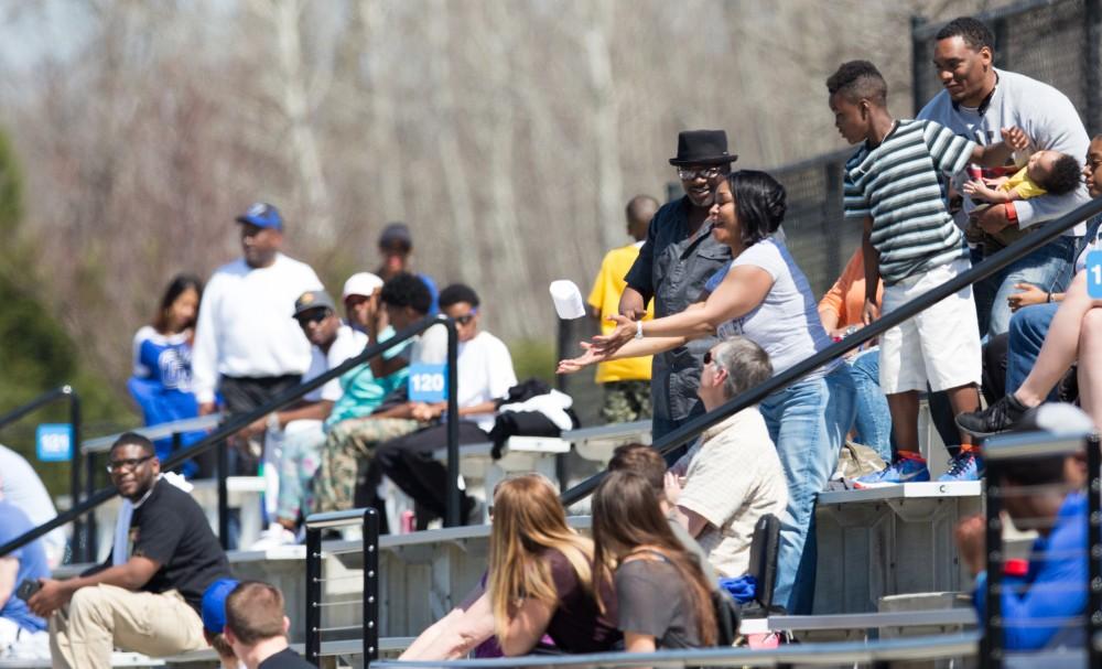 GVL / Kevin Sielaff - Fans participate in a tee-shirt toss and grab at the flying tees. The 2016 Grand Valley State Spring Classic is hosted at Lubbers Stadium on Saturday, April 16, 2016.