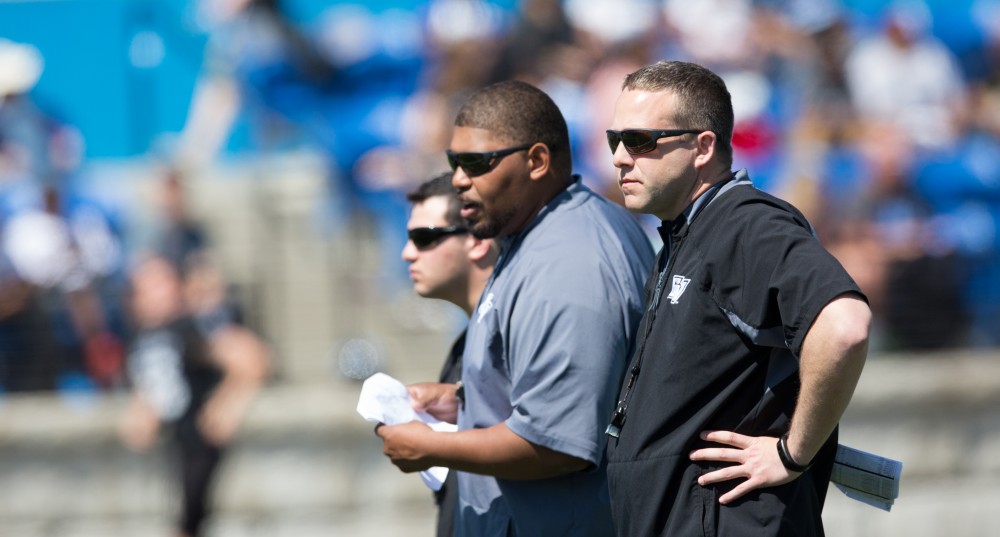 GVL / Kevin Sielaff - Head coach Matt Mitchell look on toward the play with defensive line coach E.J. Whitlow. The 2016 Grand Valley State Spring Classic is hosted at Lubbers Stadium on Saturday, April 16, 2016.