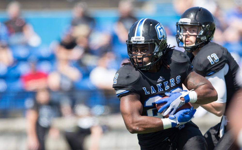 GVL / Kevin Sielaff - Terrell Dorsey (22) receives a handoff and charges upfield. The 2016 Grand Valley State Spring Classic is hosted at Lubbers Stadium on Saturday, April 16, 2016.