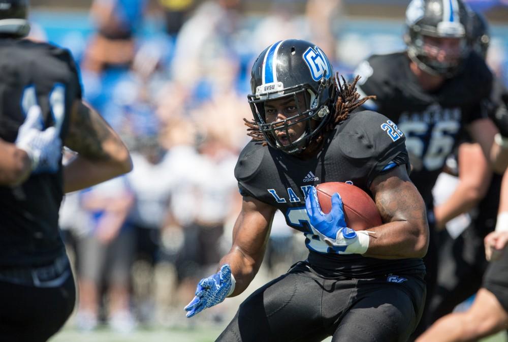 GVL / Kevin Sielaff - Terrell Dorsey (22) receives a handoff and charges upfield. The 2016 Grand Valley State Spring Classic is hosted at Lubbers Stadium on Saturday, April 16, 2016.