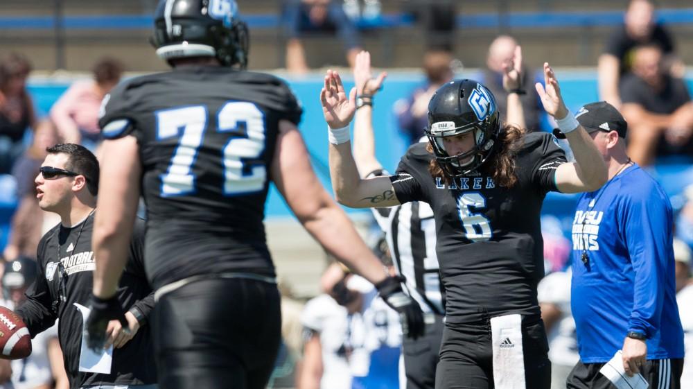 GVL / Kevin Sielaff - Bart Williams (6) reacts to a touchdown pass on his first throw of the scrimmage. The 2016 Grand Valley State Spring Classic is hosted at Lubbers Stadium on Saturday, April 16, 2016.