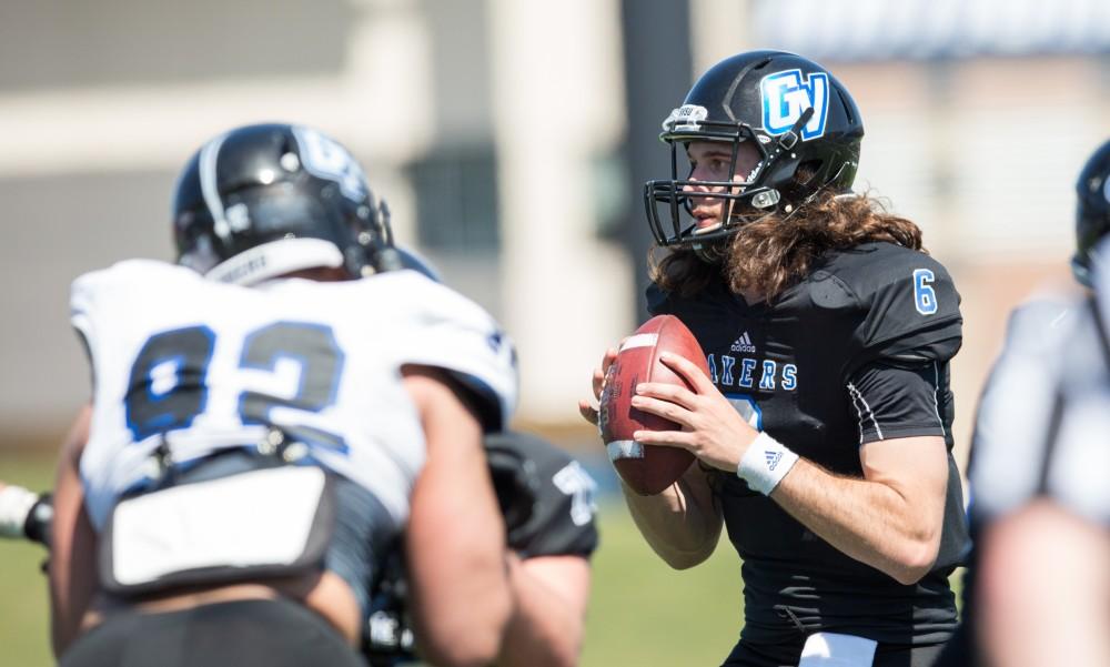 GVL / Kevin Sielaff - Bart Williams (6) looks toward the endzone as he lines up a pass. The 2016 Grand Valley State Spring Classic is hosted at Lubbers Stadium on Saturday, April 16, 2016.