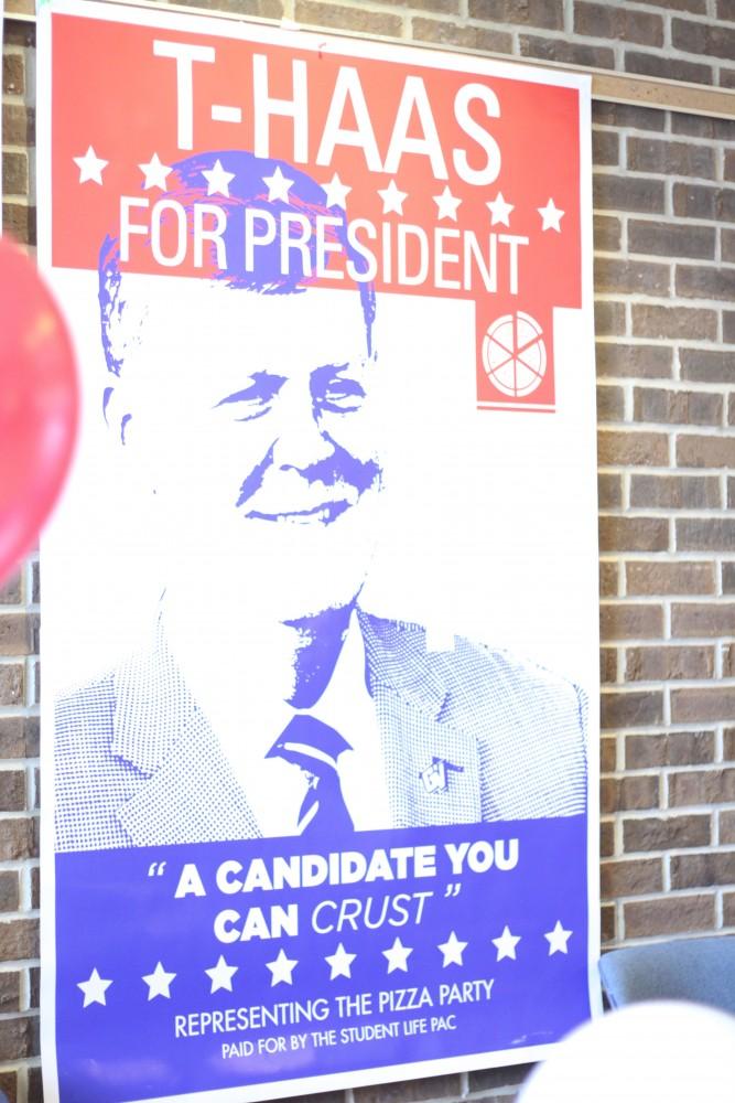 GVL / Kasey Garvelink - Posters were hung up for the Pizza with President T. Haas on Apr. 1, 2016 in Allendale. 