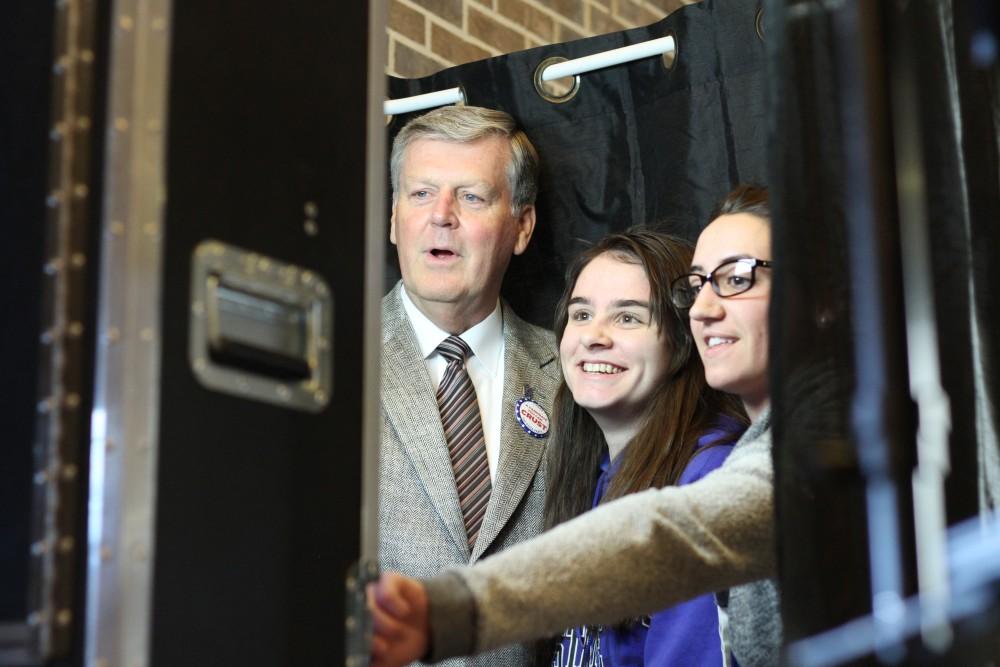 GVL / Kasey Garvelink - President T. Haas takes photos with students during a Student Life event on Apr. 1, 2016 in Allendale. 