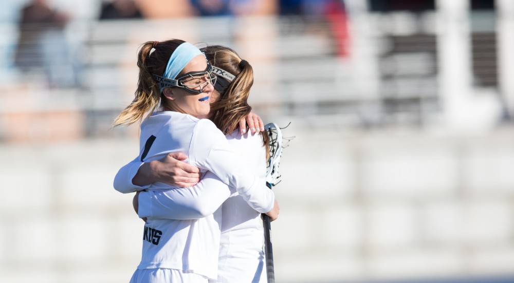 GVL / Kevin Sielaff – Ryan Skomial (1) and Meghan Datema (18) celebrate a goal. The Lakers take the victory over Tiffin University Friday, April 1, 2016.