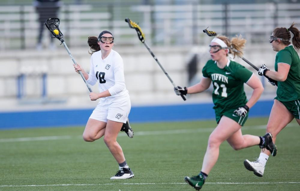 GVL / Kevin Sielaff – Meghan Datema (18) holds the ball at mid-field. The Lakers take the victory over Tiffin University Friday, April 1, 2016.