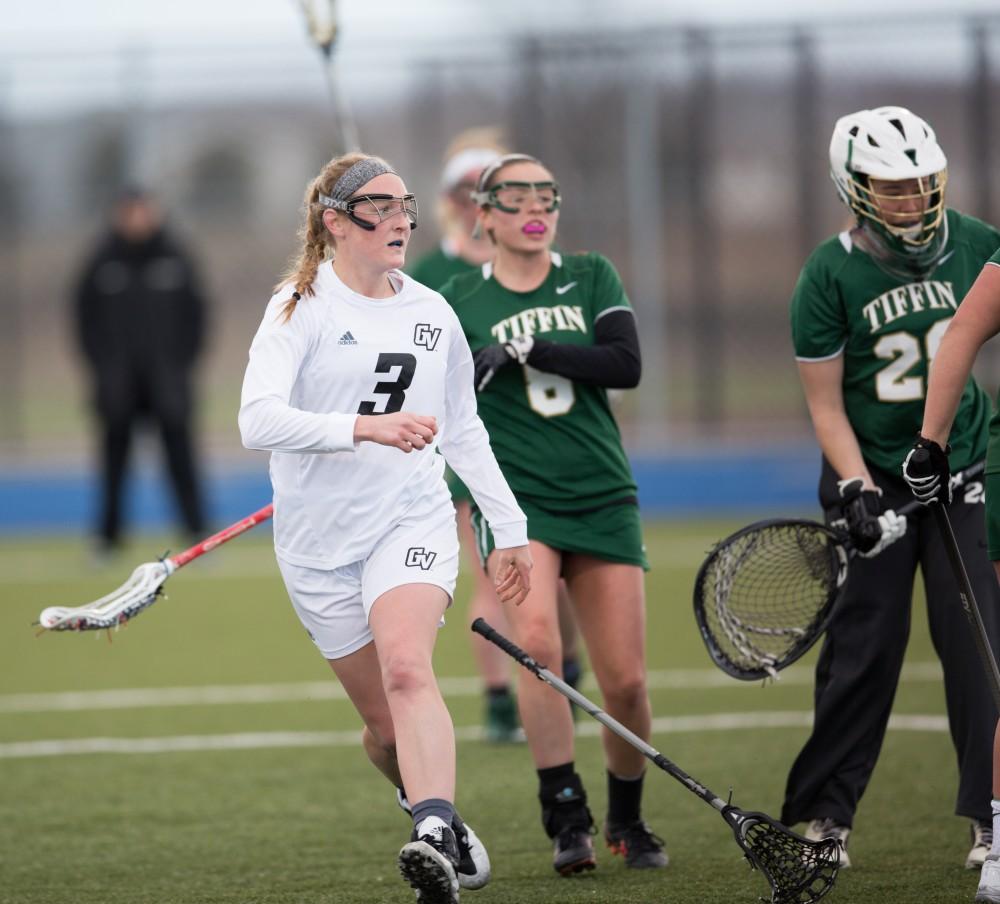 GVL / Kevin Sielaff – Erika Neumen (3) drops her stick after scoring on Tiffin's net. The Lakers take the victory over Tiffin University Friday, April 1, 2016.