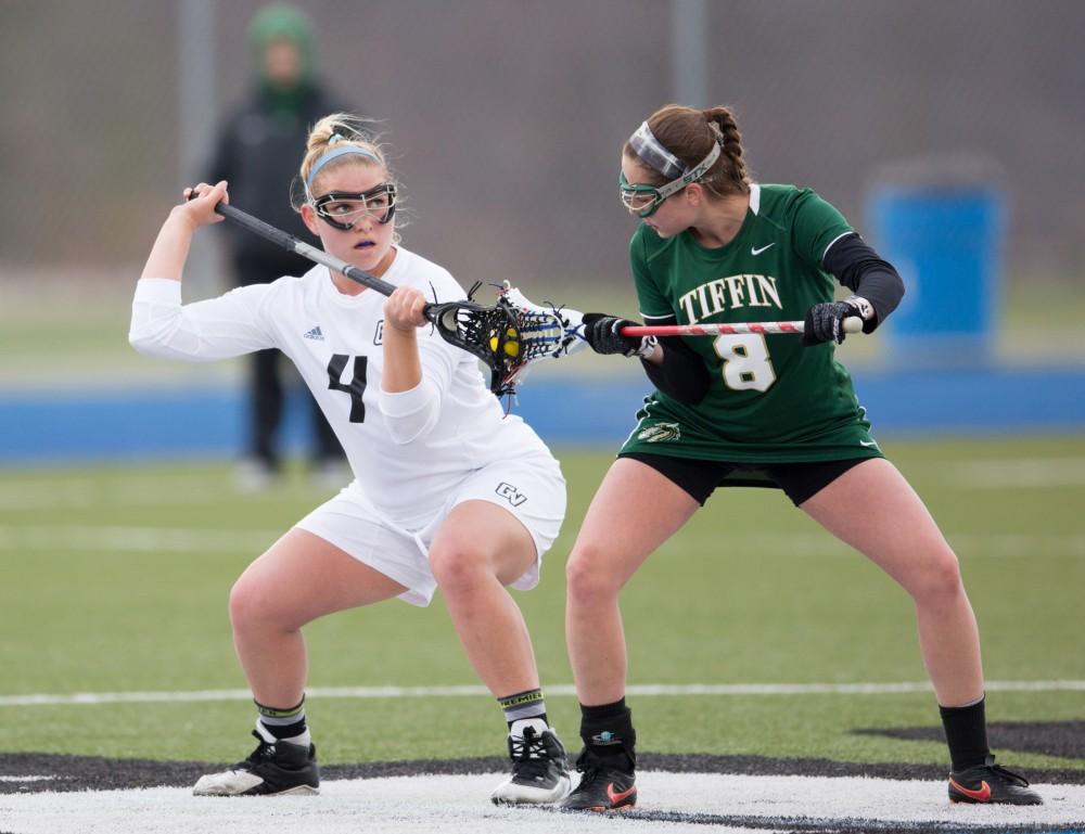 GVL / Kevin Sielaff – Kira Dosenberry (4) takes a face-off at mid-field. The Lakers take the victory over Tiffin University Friday, April 1, 2016.