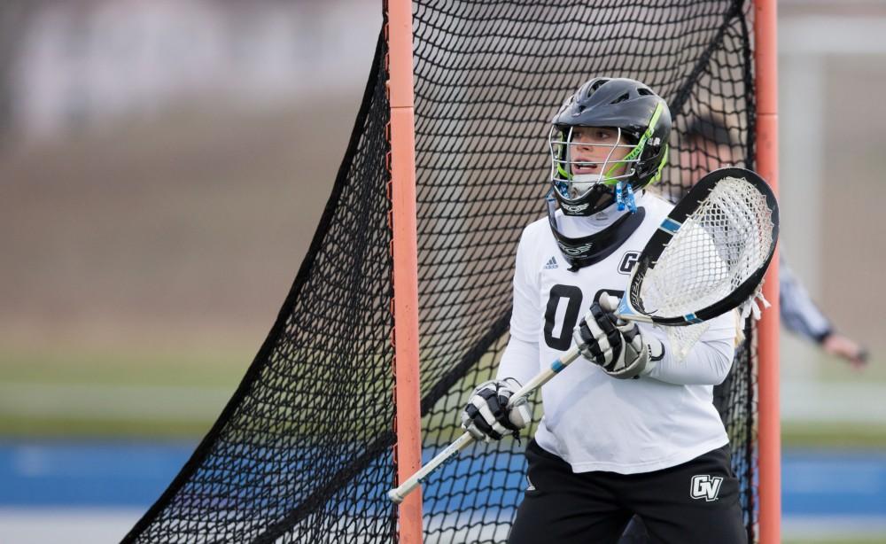 GVL / Kevin Sielaff – Sarah Zwilsky (00) stands ready in Grand Valley's net. The Lakers take the victory over Tiffin University Friday, April 1, 2016.