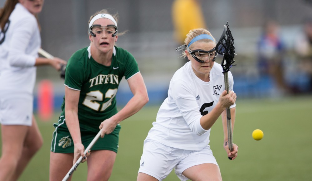 GVL / Kevin Sielaff – Ashley Bailey (6) has her stick checked and loses control of the ball. The Lakers take the victory over Tiffin University Friday, April 1, 2016.