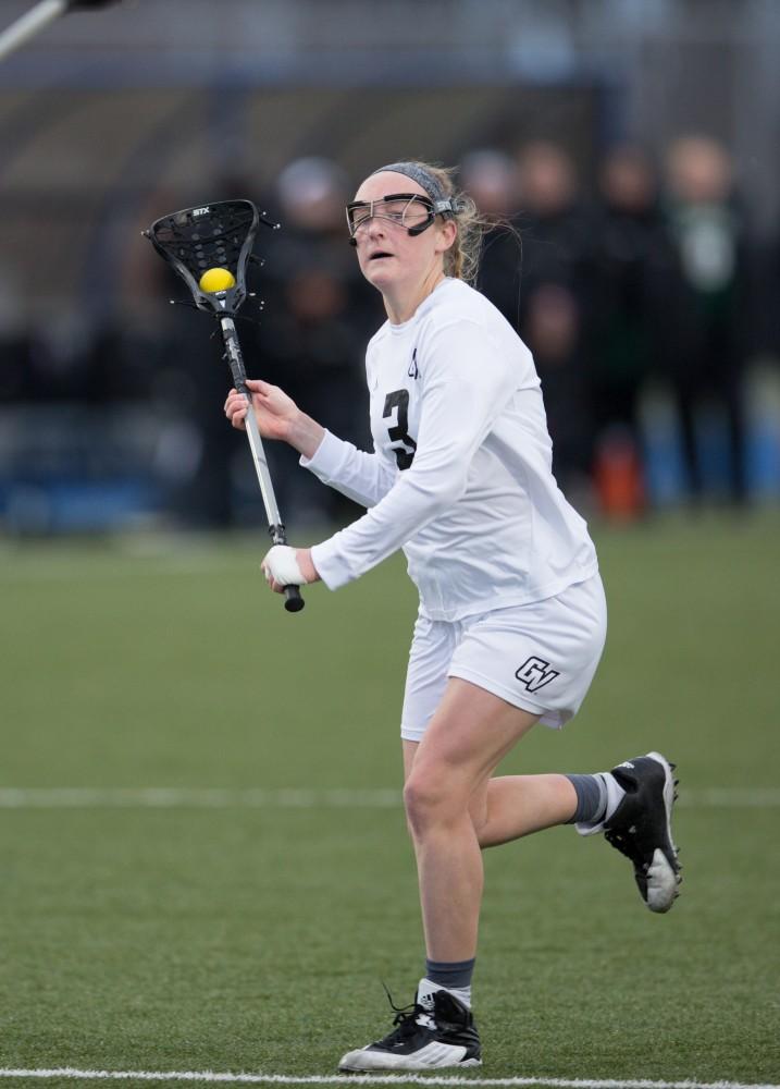 GVL / Kevin Sielaff – Erika Neumen (3) moves in for a shot on Tiffin's net. The Lakers take the victory over Tiffin University Friday, April 1, 2016.