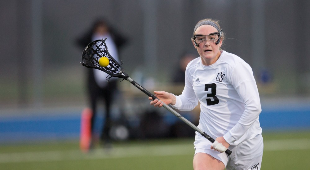 GVL / Kevin Sielaff – Erika Neumen (3) moves in on Tiffin's net, tries a shot, and scores. The Lakers take the victory over Tiffin University Friday, April 1, 2016.