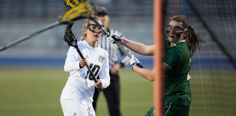 GVL / Kevin Sielaff – Chelsey Bishop (10) fires a shot on Tiffin's net. The Lakers take the victory over Tiffin University Friday, April 1, 2016.