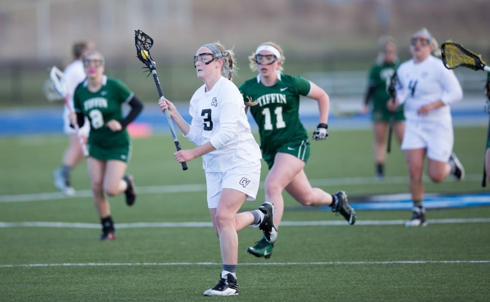 GVL / Kevin Sielaff – Erika Neumen (3) carries the ball up and into Tiffin's zone. The Lakers take the victory over Tiffin University Friday, April 1, 2016.