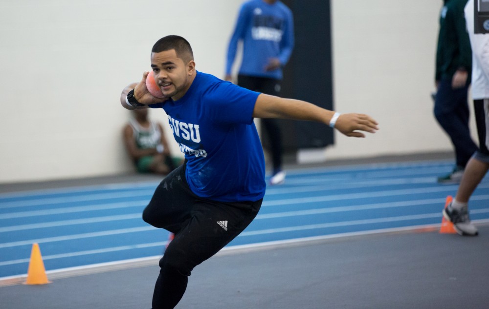 GVL / Kevin Sielaff - Darien Thornton participates in the men's shot put competition.  The Kelly Family Sports Center hosts the Bob Eubanks Open Jan. 15, 2016.