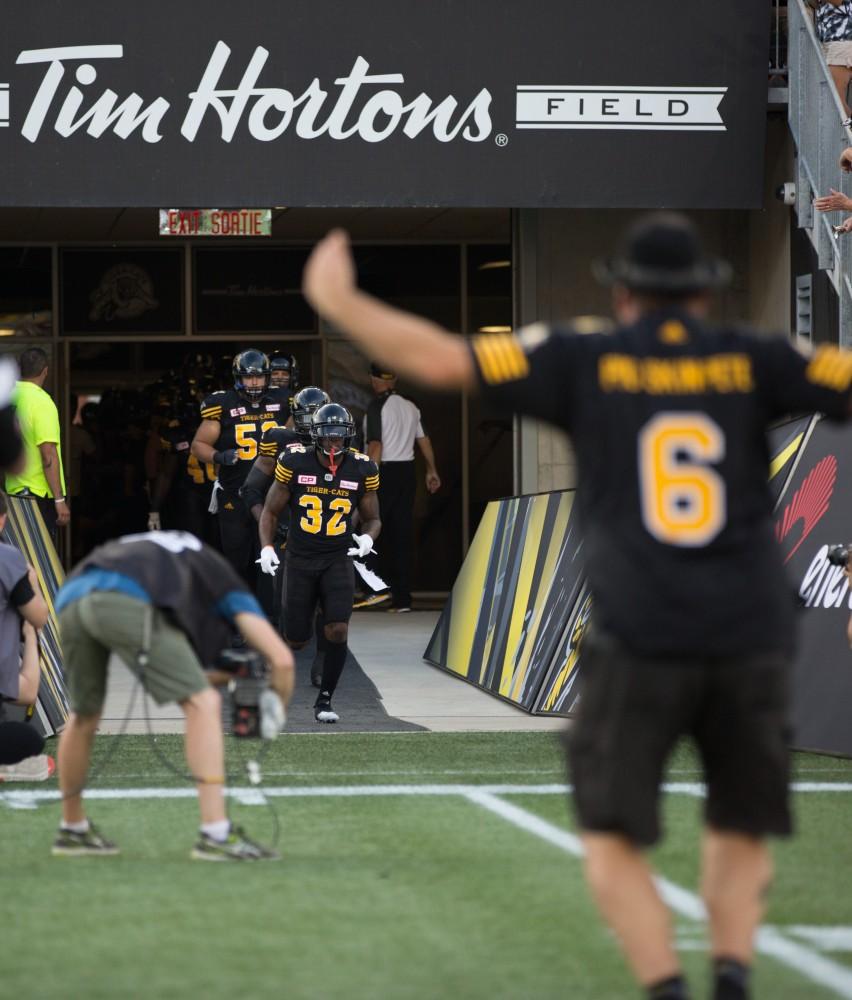 GVL/Kevin Sielaff - The Tiger-Cats take the field. The Hamilton Tiger-Cats square off against the Saskatchewan Roughriders Saturday, August 20, 2016 in Hamilton, Ontario. 