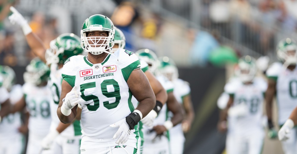 GVL/Kevin Sielaff - Josiah St. John of the Roughriders takes the field at the start of the match. The Hamilton Tiger-Cats square off against the Saskatchewan Roughriders Saturday, August 20, 2016 in Hamilton, Ontario. 