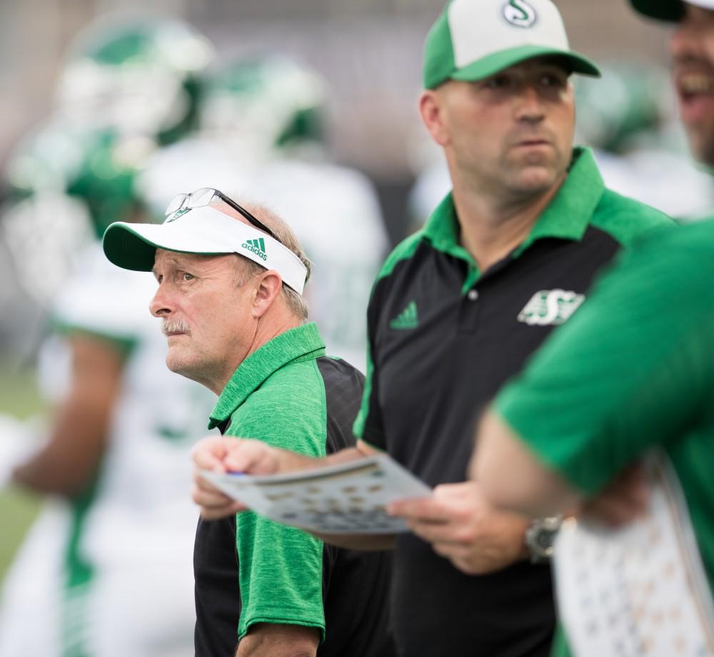 GVL/Kevin Sielaff - The coaching staff of the Roughriders look on toward the scoreboard in discontent. The Hamilton Tiger-Cats square off against the Saskatchewan Roughriders Saturday, August 20, 2016 in Hamilton, Ontario. 