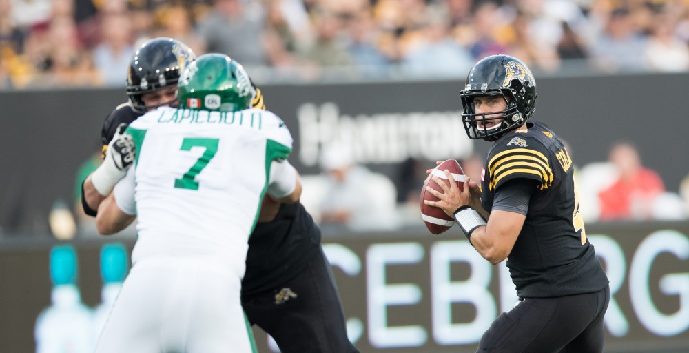 GVL/Kevin Sielaff - Zach Collaros (4) scans through traffic and looks for an open receiver down field. The Hamilton Tiger-Cats square off against the Saskatchewan Roughriders Saturday, August 20, 2016 in Hamilton, Ontario. 