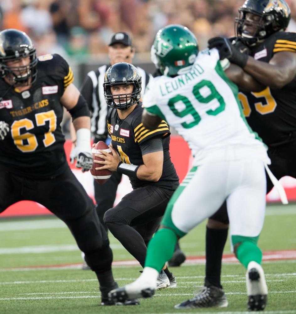 GVL/Kevin Sielaff - QB Zach Collaros looks through the Roughriders' screens and finds a receiver down field. The Hamilton Tiger-Cats square off against the Saskatchewan Roughriders Saturday, August 20, 2016 in Hamilton, Ontario. 