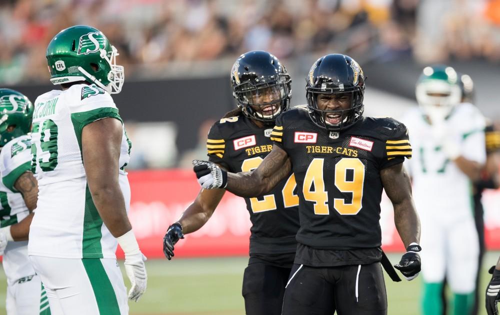 GVL/Kevin Sielaff - Larry Dean reacts after stopping the Roughriders on third down. The Hamilton Tiger-Cats square off against the Saskatchewan Roughriders Saturday, August 20, 2016 in Hamilton, Ontario. 