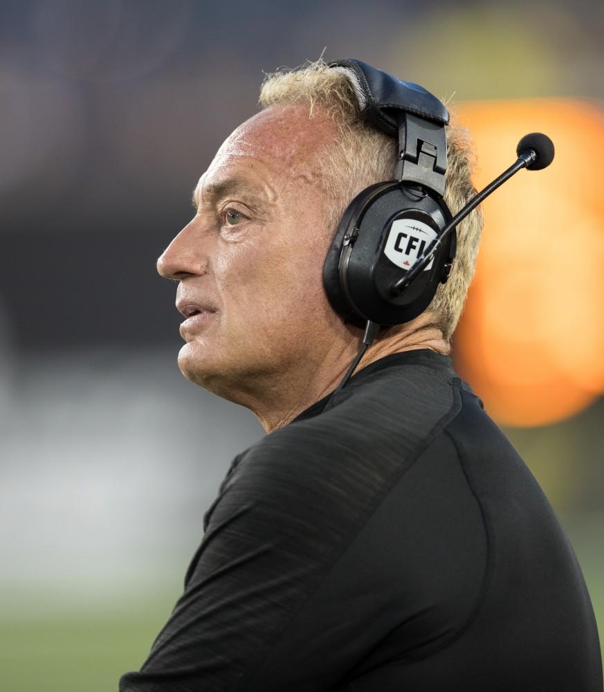 GVL/Kevin Sielaff - The Tiger-Cats coaching staff looks on toward the play. The Hamilton Tiger-Cats square off against the Saskatchewan Roughriders Saturday, August 20, 2016 in Hamilton, Ontario. 