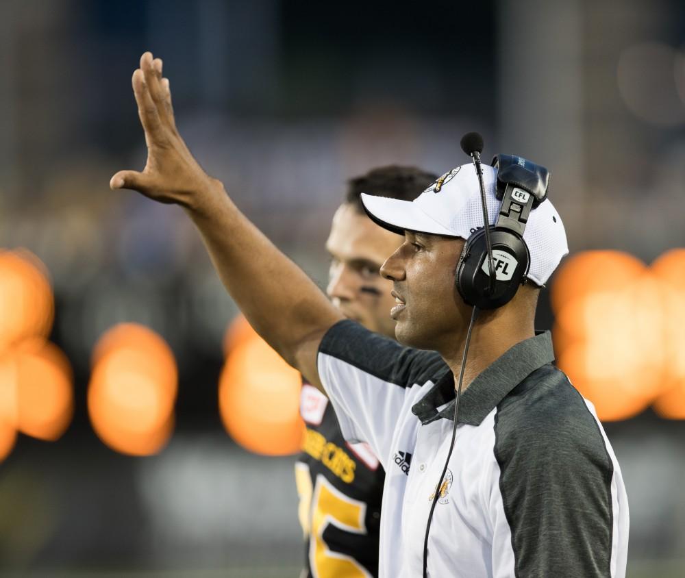 GVL/Kevin Sielaff - The Tiger-Cats coaching staff directs their players on the field. The Hamilton Tiger-Cats square off against the Saskatchewan Roughriders Saturday, August 20, 2016 in Hamilton, Ontario. 