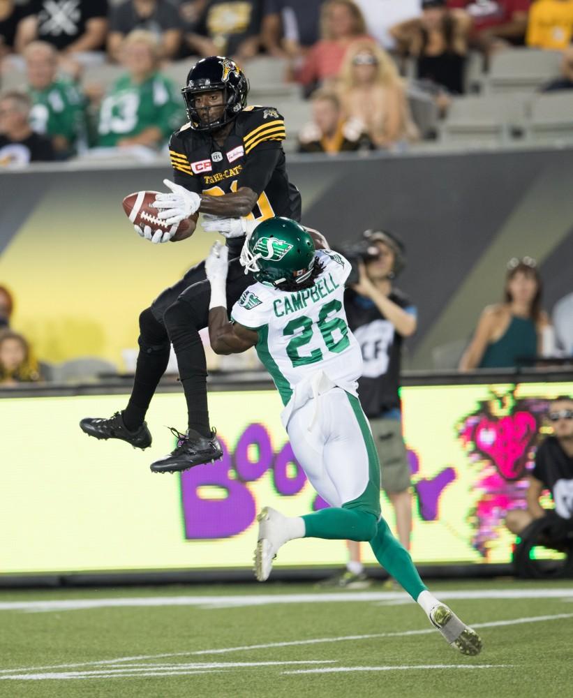 GVL/Kevin Sielaff - Terrence Toliver (80) elevates and receives a pass. The Hamilton Tiger-Cats square off against the Saskatchewan Roughriders Saturday, August 20, 2016 in Hamilton, Ontario. 