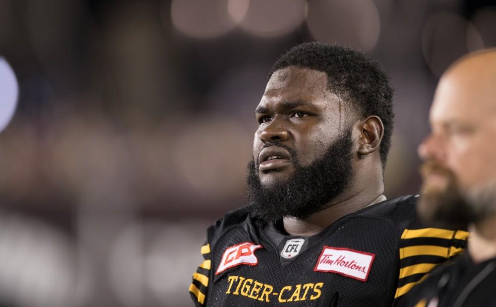 GVL/Kevin Sielaff - Jeremy Lewis (56) looks on toward the play. The Hamilton Tiger-Cats square off against the Saskatchewan Roughriders Saturday, August 20, 2016 in Hamilton, Ontario. 