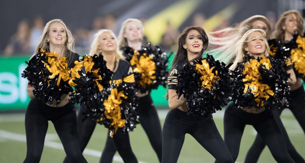 GVL/Kevin Sielaff - The Tiger-Cat cheerleaders take the field in between plays. The Hamilton Tiger-Cats square off against the Saskatchewan Roughriders Saturday, August 20, 2016 in Hamilton, Ontario.  