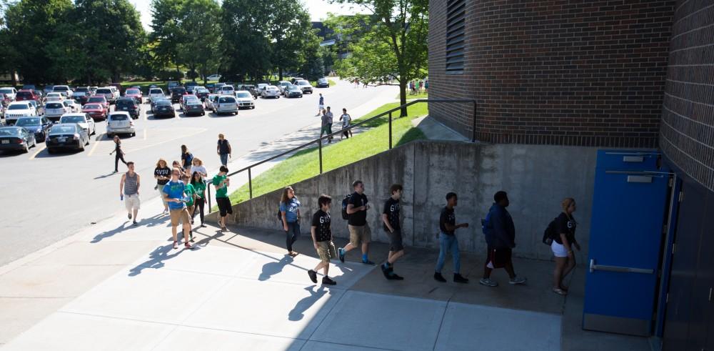 GVL/Kevin Sielaff - Students file into the Fieldhouse Arena for Grand Valley's annual Convocation ceremonies on Friday, August 26, 2016.  