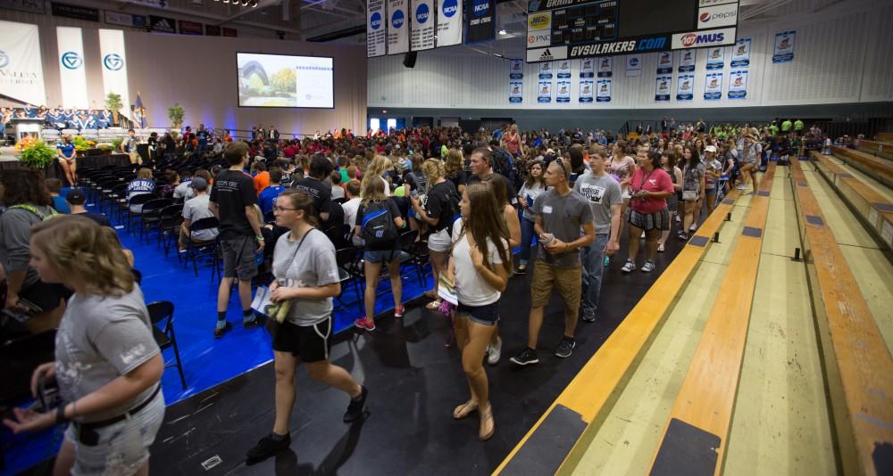 GVL/Kevin Sielaff - Students file into the Fieldhouse Arena for Grand Valley's annual Convocation ceremonies on Friday, August 26, 2016.  