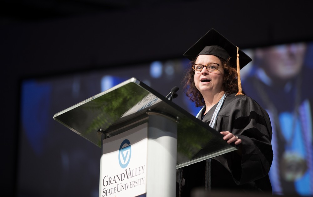 GVL/Kevin Sielaff - Professor of communication studies Danielle Leek speaks at Grand Valley's annual Convocation ceremonies on Friday, August 26, 2016.  