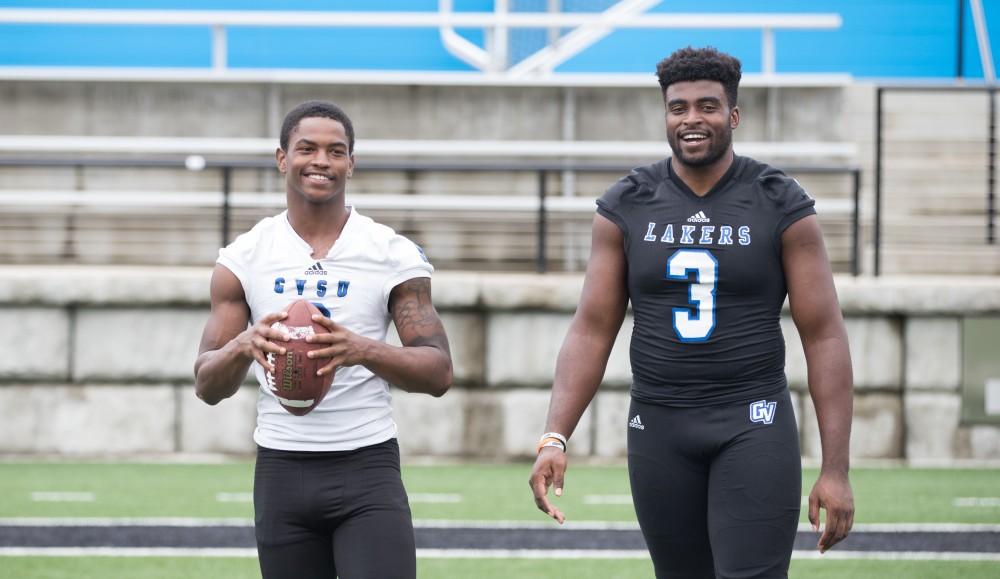 GVL / Kevin Sielaff - Jacob Studdard (9) and Sydney Omameh (3) throw the football around. Grand Valley State football hosts its annual media day at Lubbers Stadium on Thursday, August 25, 2016. 