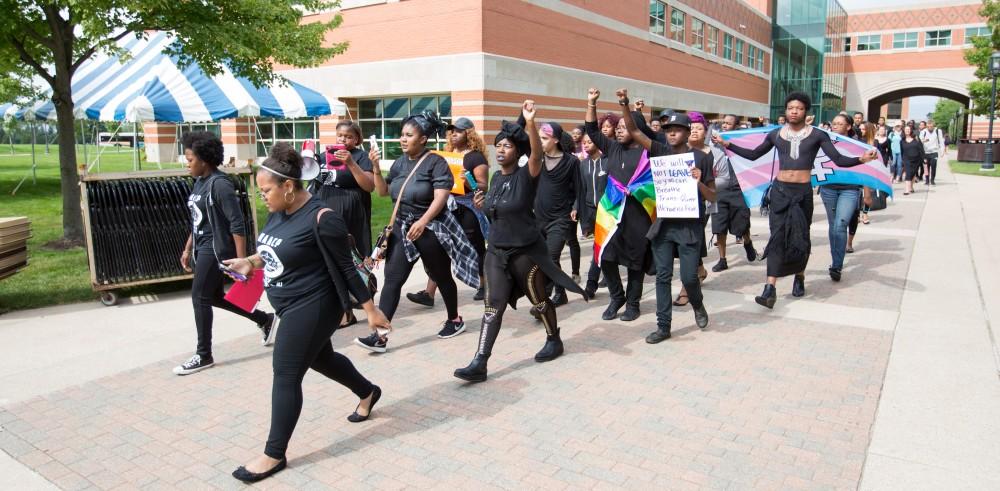 GVL/Kevin Sielaff - Grand Valley's NAACP chapter holds a campus wide demonstration in protest of police brutality Friday, Sept. 23, 2016 in Allendale.