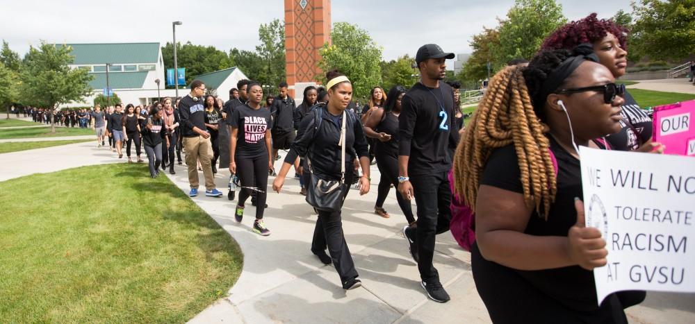 GVL/Kevin Sielaff - Grand Valley's NAACP chapter holds a campus wide demonstration in protest of police brutality Friday, Sept. 23, 2016 in Allendale.