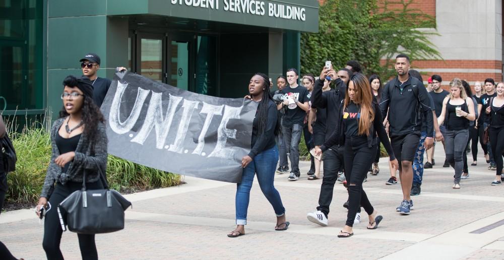 GVL/Kevin Sielaff - Grand Valley's NAACP chapter holds a campus wide demonstration in protest of police brutality Friday, Sept. 23, 2016 in Allendale.