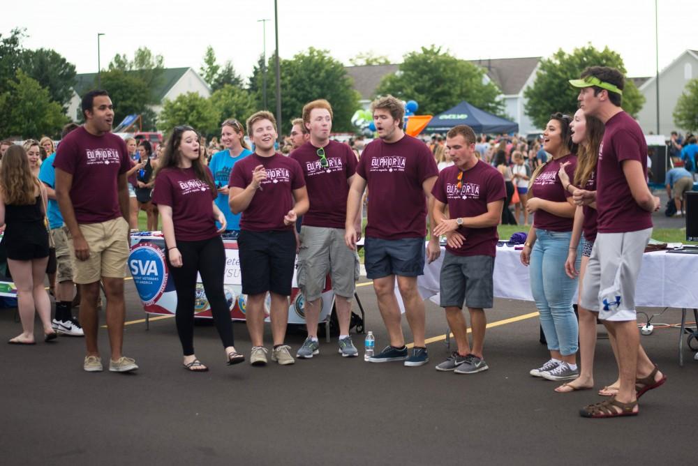 GVL / Luke Holmes - Co-ed A Capella group, Euphoria, sings during Campus Life Night. Campus Night Life was held in the Parking Lot H on Tuesday, Sep. 6, 2016.