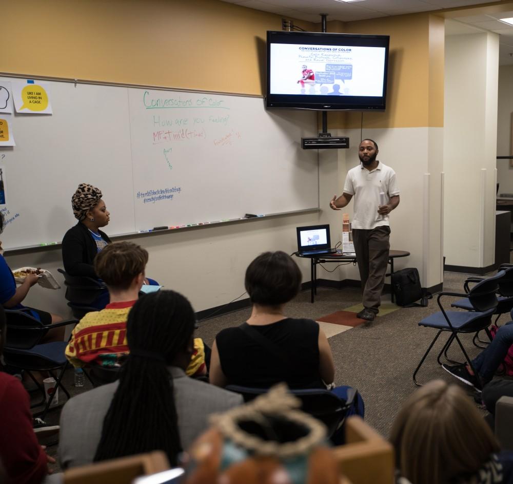 GVL/Kevin Sielaff - ReChard Peel speaks inside the Office of Multicultural Affairs Wednesday, Sept. 21, 2016 as part of Conversations of Color.