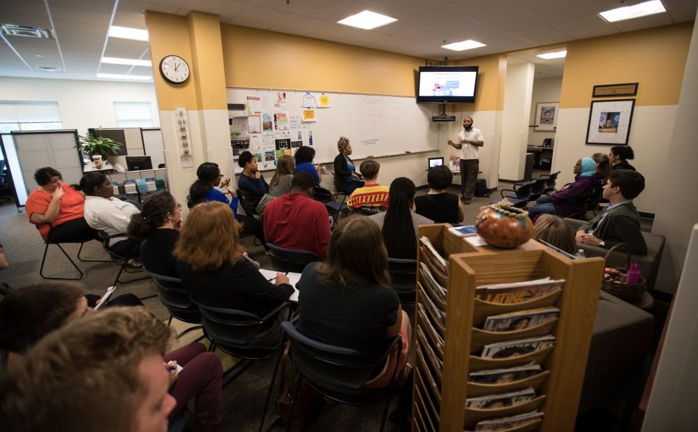 GVL/Kevin Sielaff - ReChard Peel speaks inside the Office of Multicultural Affairs Wednesday, Sept. 21, 2016 as part of Conversations of Color.